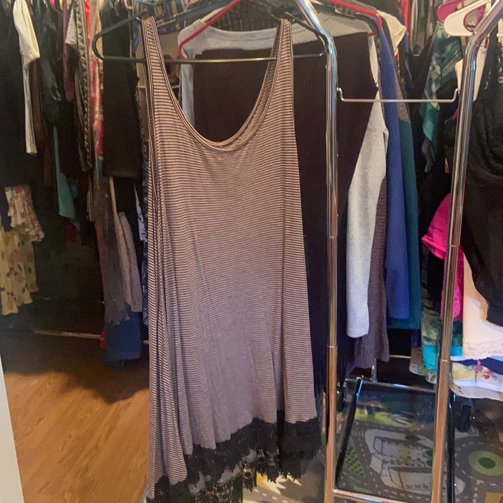 Tunic tank top with lace bottom detail
